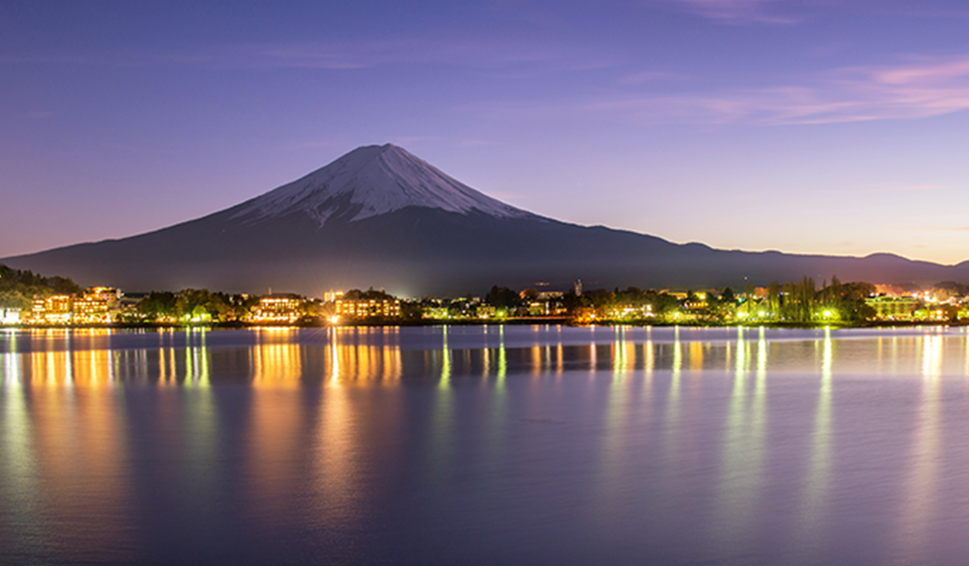 Mount Fuji and Tokyo at Night with Lights and Purple Sky